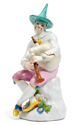 FIGURE OF A HARLEQUIN WITH BAGPIPES Meissen, ca. 1745.