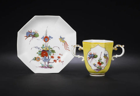 Meissen octagonal yellow-ground double-handled beaker and saucer circa 1735, Ex Hoffmeister Collection.