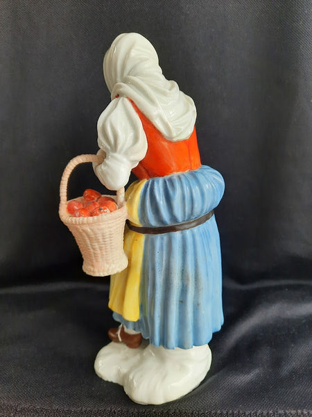 Meissen Porcelain Figure of a Peasant Apple Seller, 1745-1750