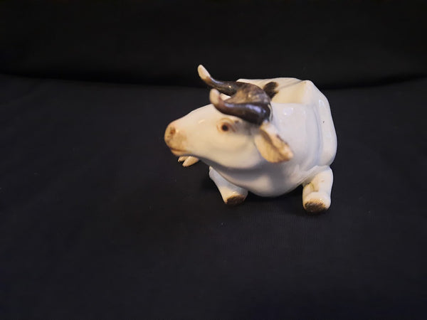 Meissen Porcelain Figurine of a Recumbent Fresian Cow, 1750