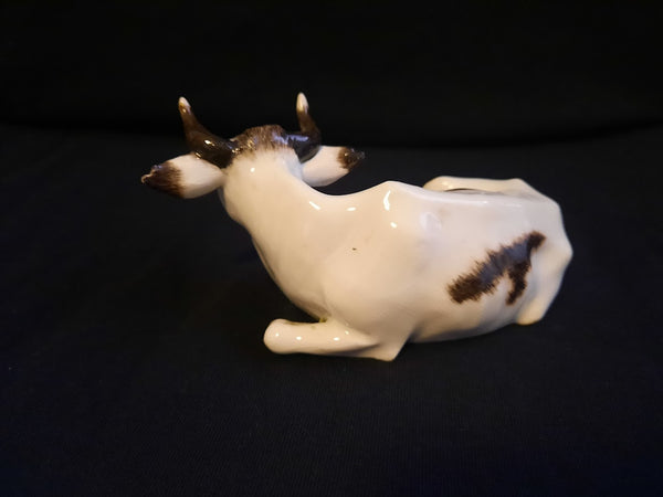 Meissen Porcelain Figurine of a Recumbent Fresian Cow, 1750