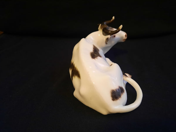 Meissen Porcelain Figurine of a Recumbent Fresian Cow, 1750
