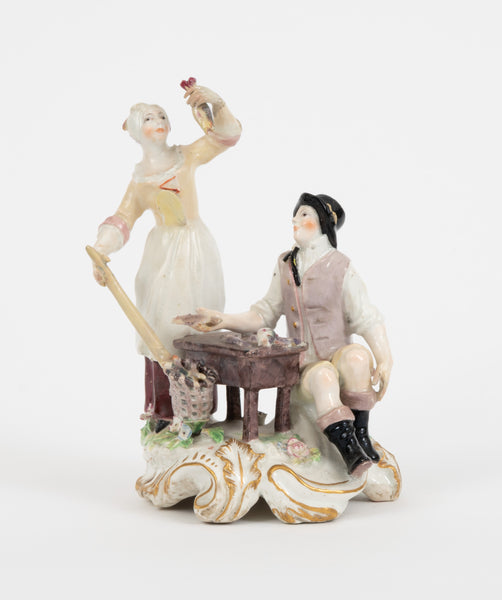 A rare Chelsea figure group of the fish seller and his wife, c.1756-57