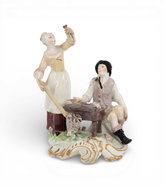 A rare Chelsea figure group of the fish seller and his wife, c.1756-57