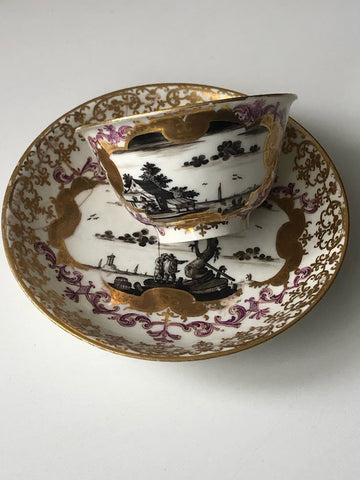 Meissen Porcelain Kauffahrtei Scene Schwarzlot Tea Bowl & Saucer, 1723-1724