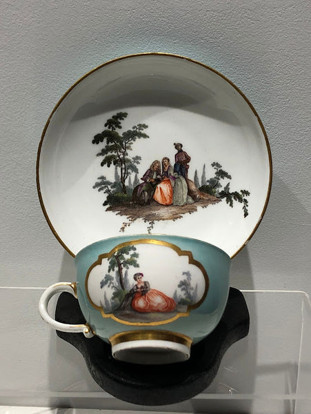Meissen Turquoise Ground Cup & Saucer with Courting Couples, circa 1740