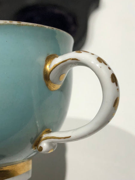 Meissen Turquoise Ground Cup & Saucer with Courting Couples, circa 1740