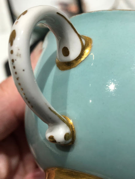 Meissen Turquoise Ground Cup & Saucer with Courting Couples, circa 1740