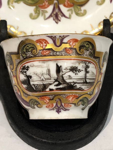 Meissen Porcelain Hausmaler Tea Bowl & Saucer with Landscape Scenes, circa 1740