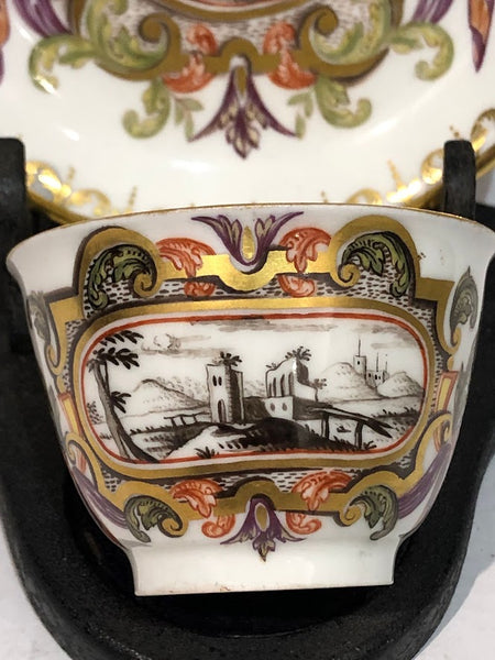 Meissen Porcelain Hausmaler Tea Bowl & Saucer with Landscape Scenes, circa 1740