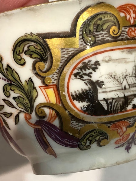 Meissen Porcelain Hausmaler Tea Bowl & Saucer with Landscape Scenes, circa 1740