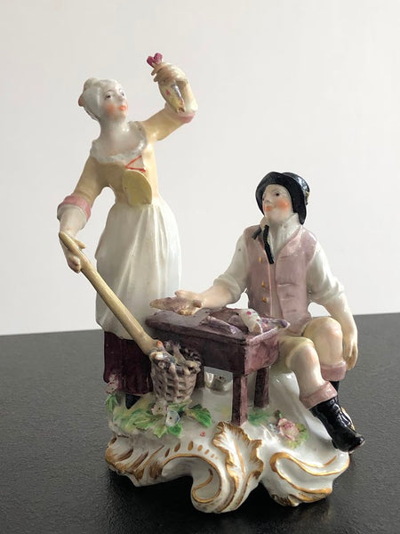 A rare Chelsea figure group of the fish seller and his wife, c.1756-57