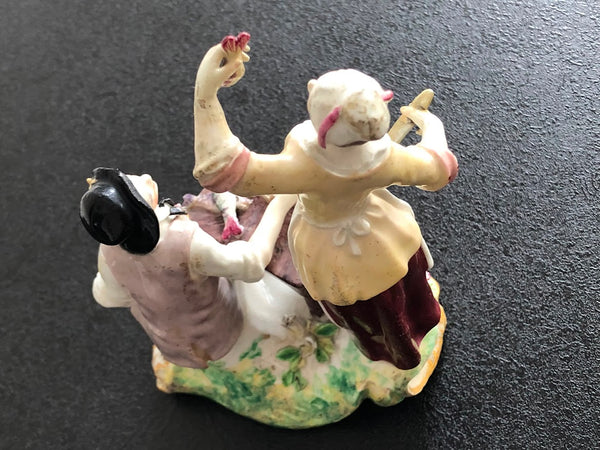 A rare Chelsea figure group of the fish seller and his wife, c.1756-57