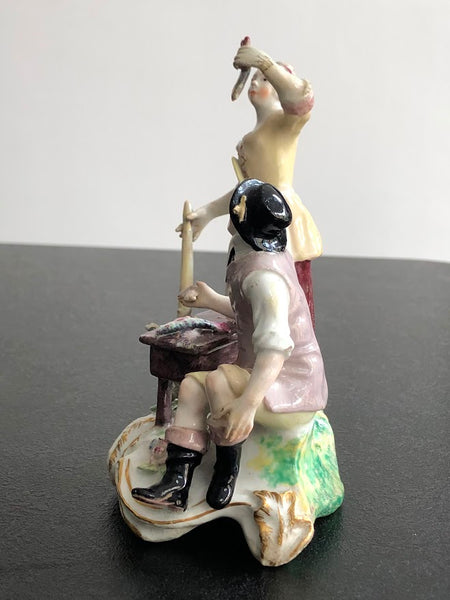 A rare Chelsea figure group of the fish seller and his wife, c.1756-57