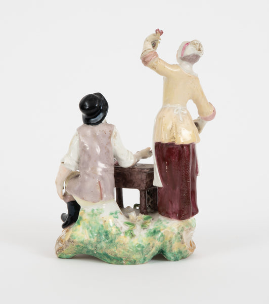 A rare Chelsea figure group of the fish seller and his wife, c.1756-57