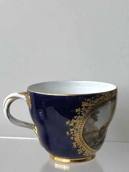 Meissen Porcelain Cobalt Blue Cup with Scene of a Boy by Riverside, 1774