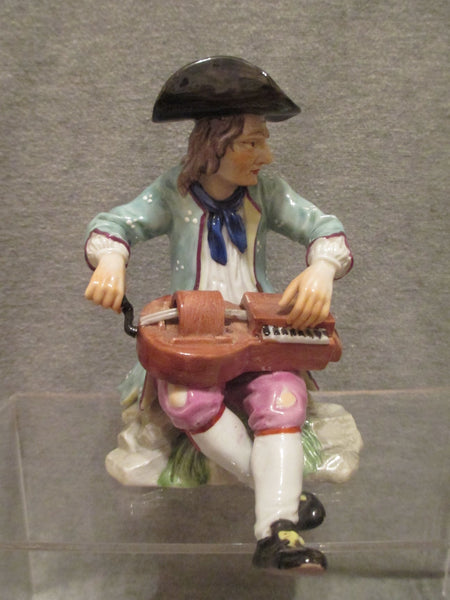 K & C Prag Porcelain Figure of a Hurdy Gurdy Player, 19th C Rare