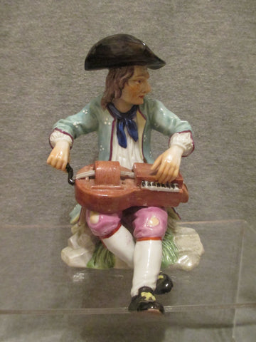 K &amp; C Prag Porcelaine Figure d'un joueur de vielle à roue, 19ème C Rare