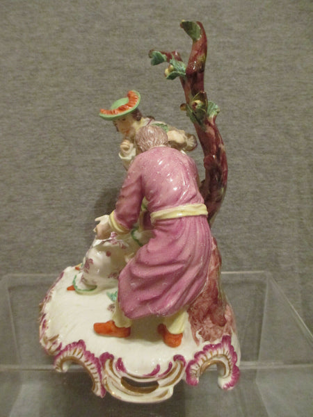 Höchst porcelain group of a fortune teller Circa 1755-60
