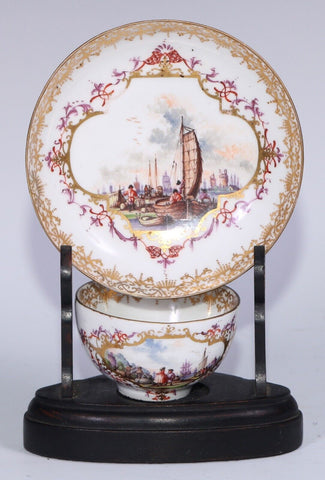 Meissen Porcelain Tea Bowl & Saucer with kauffahrtei scene. 1735 Drehers Marks